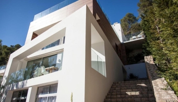 Resa estates Ibiza modern villa Cala llonga golf sale te koop house exterior day.jpg